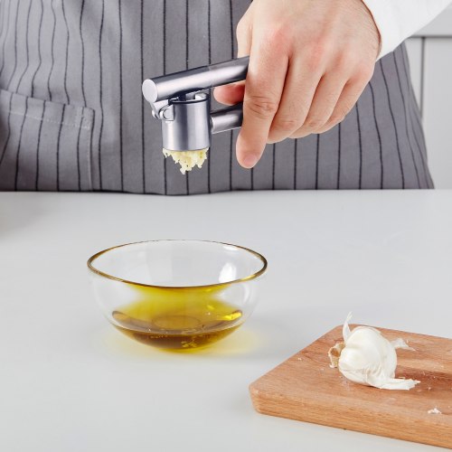 Stainless steel garlic press top